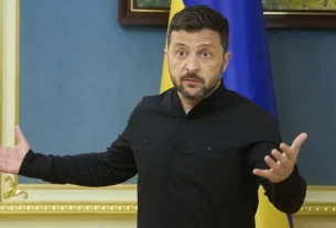 володимир зеленський розводить руками