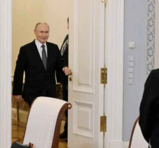 путін