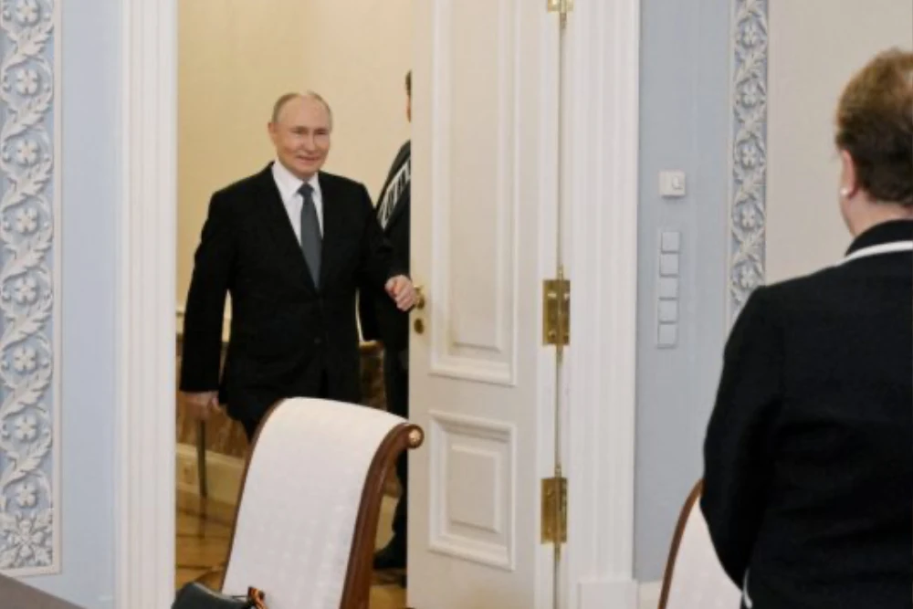 путін