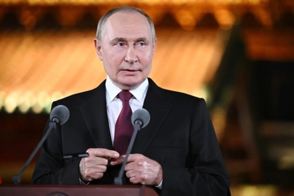 путін