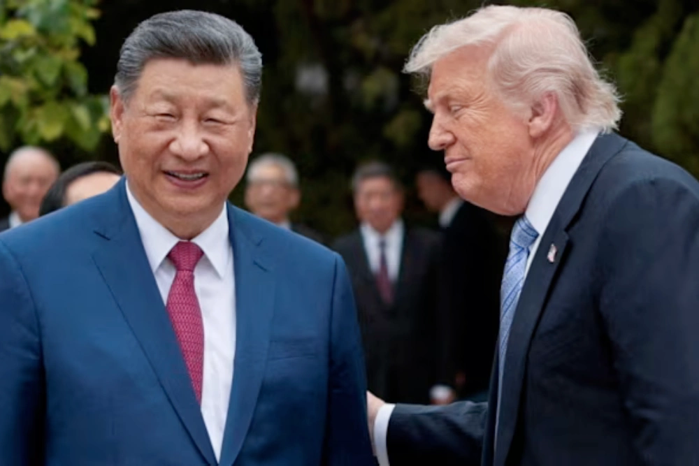 Сі Цзіньпін і Дональд Трамп у Пекіні під час саміту минулого тижня