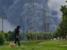 Хмари диму після атаки українського безпілотника, яка спричинила пожежі на паливному об’єкті в Москві