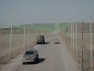 прифронтова дорога покрита антидроновою сіткою