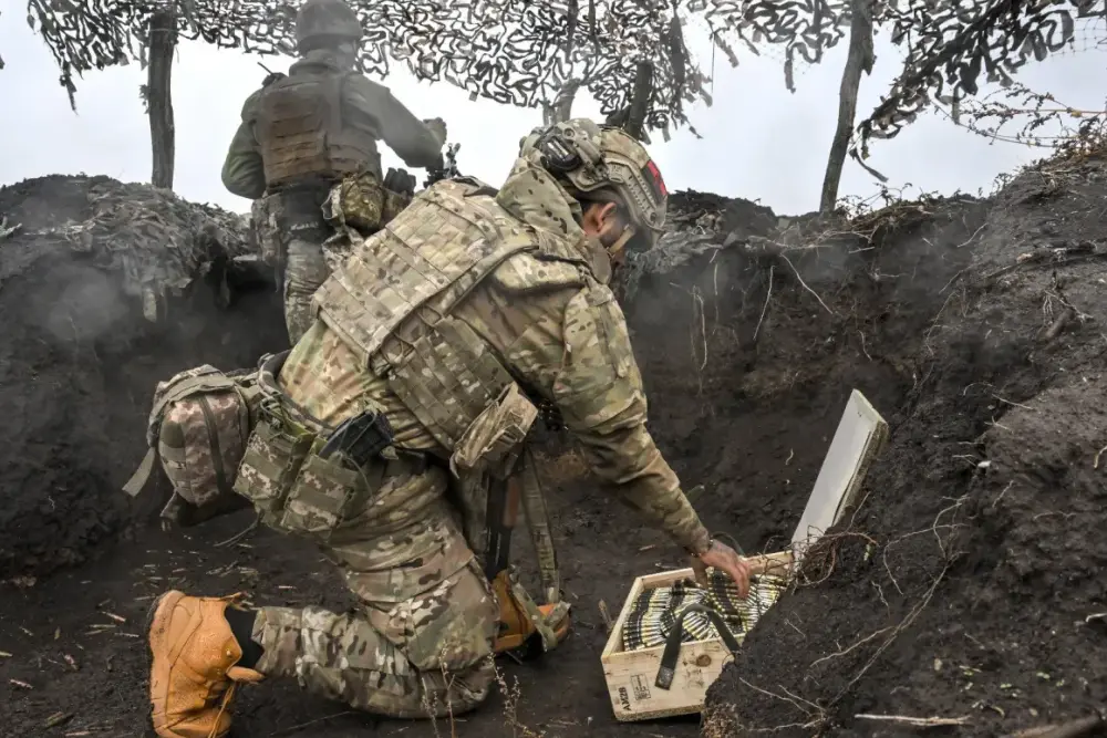 українські солдати ведуть вогонь