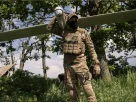 Член ударного підрозділу «Лава» з розвідувальним БПЛА «Лелека»