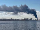 Густі хмари диму над Санкт-Петербургом, де в середу розпочалася економічна конференція.