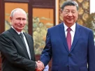 Президент Росії Володимир Путін і президент Китаю Сі Цзіньпін у Пекіні, 20 травня 2026 року