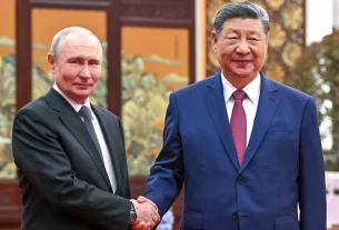 Президент Росії Володимир Путін і президент Китаю Сі Цзіньпін у Пекіні, 20 травня 2026 року
