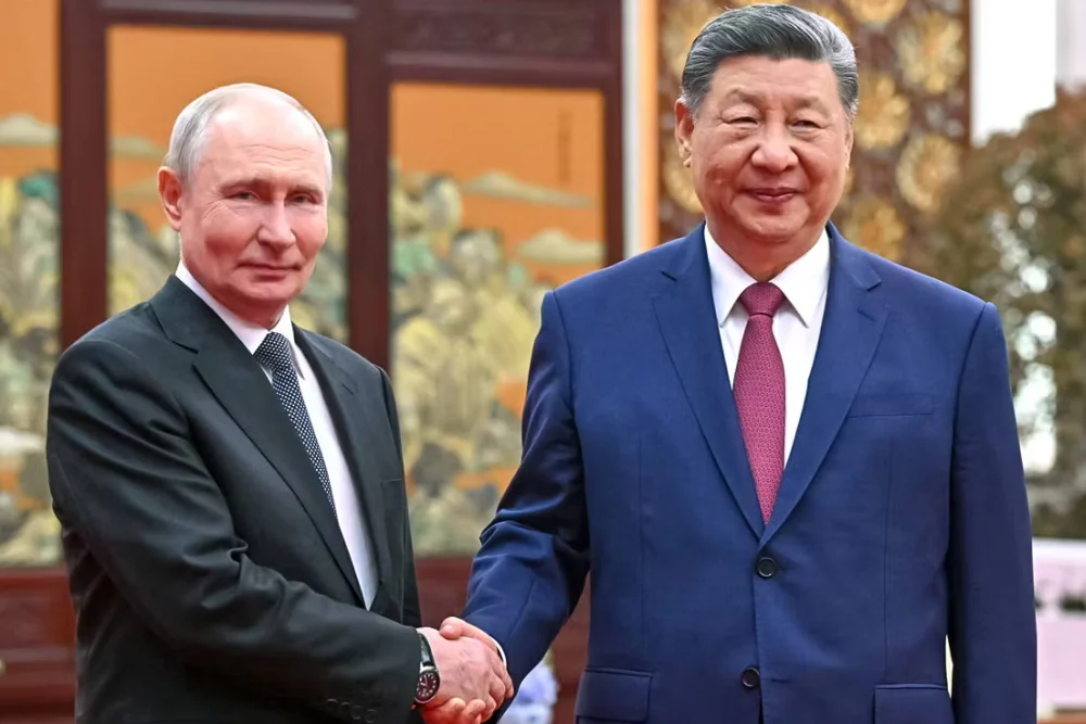 Президент Росії Володимир Путін і президент Китаю Сі Цзіньпін у Пекіні, 20 травня 2026 року