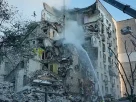Зруйнований будинок де постраждало багато людей у Києві