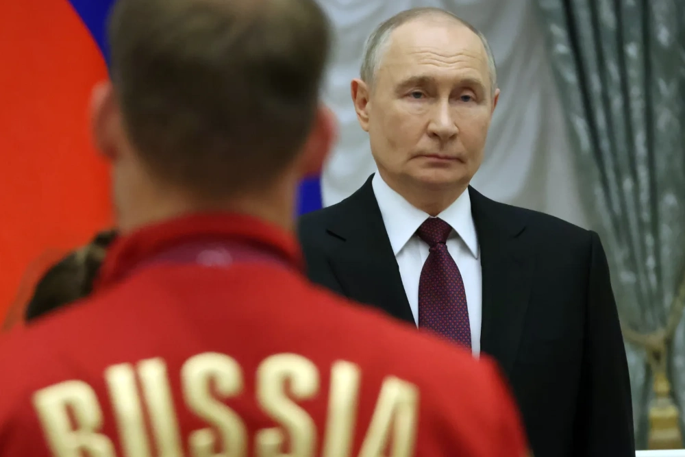 Володимир Путін спілкується з російськими спортсменами