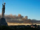 вигляд на місто Київ де на лівому березі займається дим