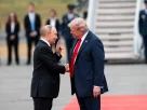 Володимир Путін та Дональд Трамп зустрічаються біля літака
